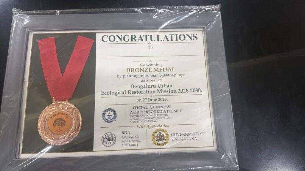 Bronze Medal and Certificate of Appreciation for planting more than 5,000 saplings under the Bengaluru Urban Ecological Restoration Mission 2026-2030
